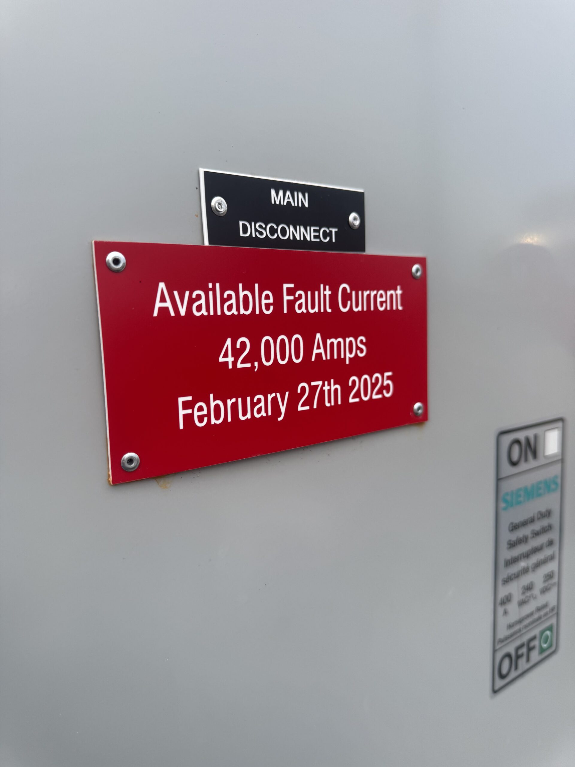 Engraved phenolic legend plate showing crisp two-color contrast and precision detail by Evermark Industrial Solutions