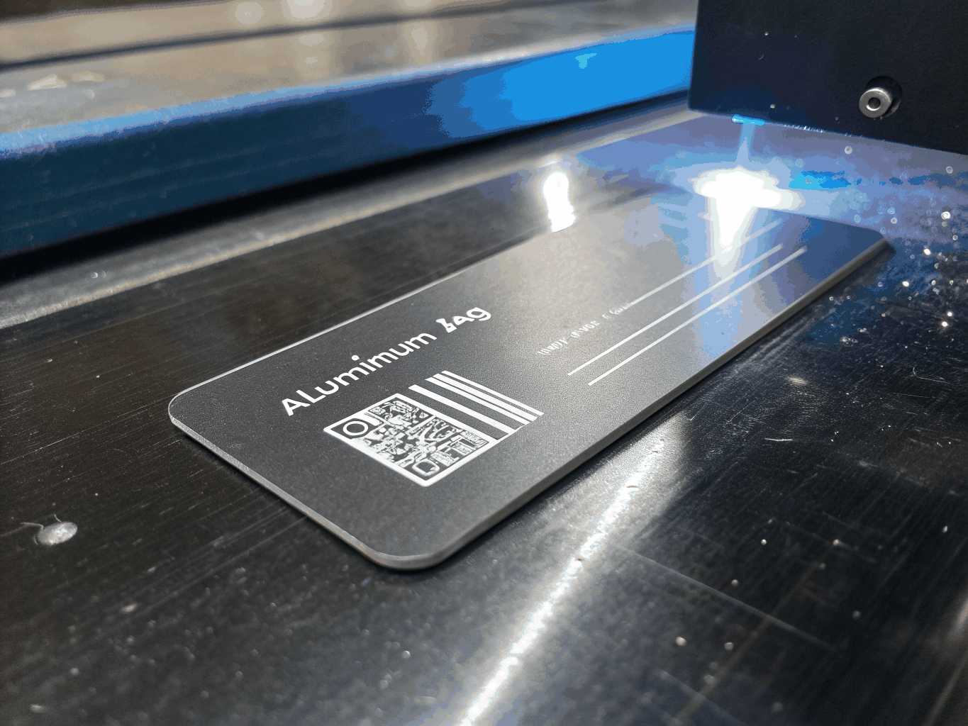 Metal engraving product photo featuring stainless steel and anodized aluminum tags