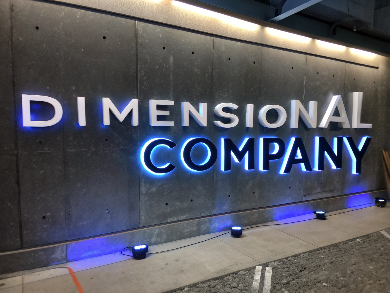 Laser-cut mirrored acrylic letters for lobby or reception signage